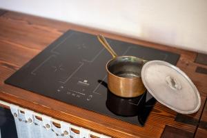 a cup sitting on top of a stove at Il Casale di Zoe in Sorano