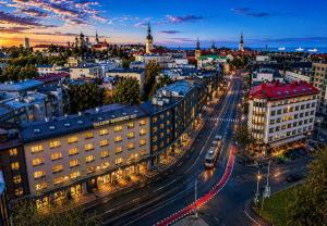 a view of a city at night at Tallinn Residence 1937 in Tallinn