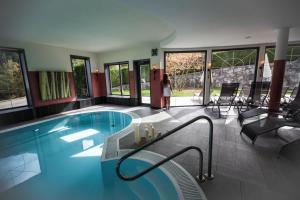 Bazén v ubytování Wellnesshotel Liun nebo v jeho okolí