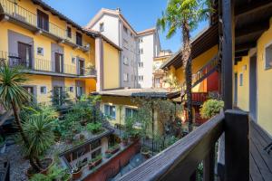 an aerial view of a city with buildings at Residenza Motta - Boutique Apartments in Locarno