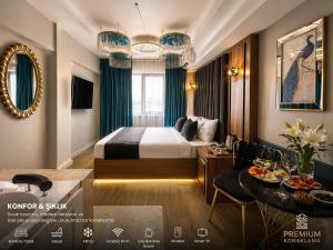 a hotel room with a bed and a table at Luka Suit Hotel in Istanbul