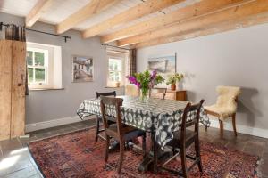 a dining room with a table and chairs at 2 Bed in St. Brides oc-k30489 in Saint Brides