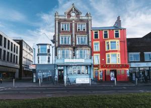 a tall building with a clock tower on top of it at The Royal Bar & Shaker in Morecambe