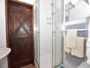 a bathroom with a shower and a glass door at 1 Bed in Brecon oc-bn336 in Talgarth +16 photos