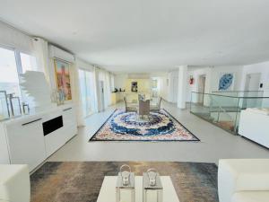 a large living room with a couch and a table at lunera Immo in Dakan