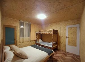 a small bedroom with a bunk bed in it at Guest house VL in Alaverdi +69 photos