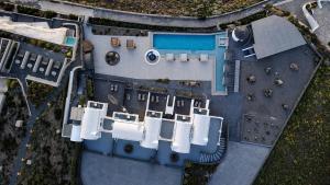 an overhead view of a building with a pool at Caldera's Memories in Imerovigli