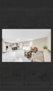 a living room with a couch and a table at Spacious house 6 bedroom near ferry in Delta +17 photos