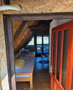 a bedroom with a bunk bed in a house at Alfa in Kulen Vakuf