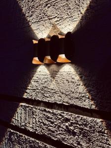 a shadow of a traffic light on a street at Jk Suites Karatu in Karatu