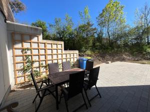 a table and chairs sitting on a patio at Auszeit in Schwaigern in Schwaigern +5 photos