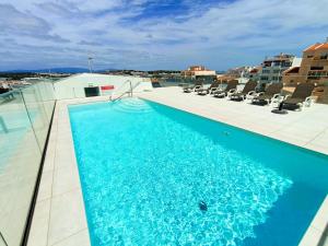 a swimming pool on the roof of a building at Rooftop pool & Luxury apartment in Lagos