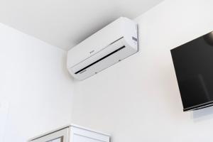 a wall mounted air conditioner on a wall at Rigoletto Apartments by Fenix in Venice