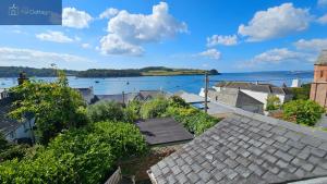 a view of the water from the roofs of houses at The Summer House in Saint Mawes