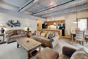 a living room with a couch and a table at Timberline Condominiums 3 Bedroom Deluxe Unit D2E in Snowmass Village