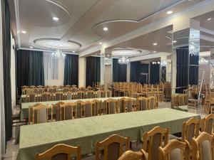 a conference room with tables and chairs at Liga Hotel and Restaurant in Shinuhayr