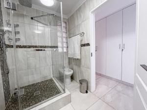 a bathroom with a shower and a toilet at Rondevoux 17 in Margate +46 photos