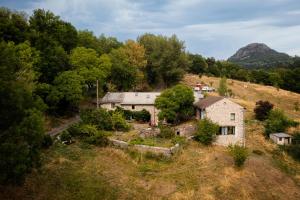 an aerial view of a house on a hill at Gîte Jules Romains in Saint-Julien-Chapteuil