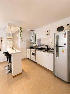 Una cocina o kitchenette en Hermoso monoambiente en el centro de la ciudad Edificio San Francisco
