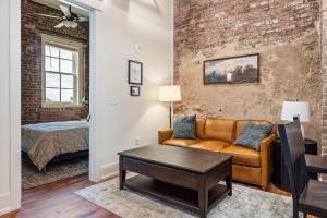 a living room with a couch and a bedroom at Southern Blue in McMinnville