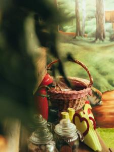 a painting of a basket and a pair of scissors at URBAN PIC NIC in Piazza Brembana +13 photos