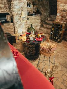 a table with food on it in a room at Al Silter in Capriate San Gervasio
