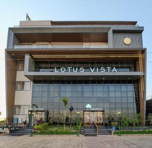 a building with a sign that reads lions vista at Lotus Vista Hotel in Alwar