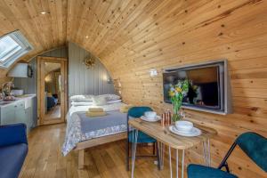 a bedroom with a bed and a table in a room at 1 Bed in Barnacre oc-w34347 in Catterall +12 photos