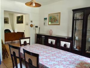 a dining room with a table and a dining room at Casa Radiosa in Sora +32 photos
