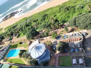 an aerial view of a resort with a beach at Stella Maris 123 in Amanzimtoti