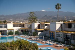 a view of a hotel with a swimming pool at Silent Paradise Drago Complex in Costa Del Silencio