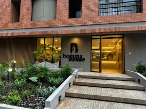 a building with stairs in front of a building at Bomma House - Parque 93 in Bogotá