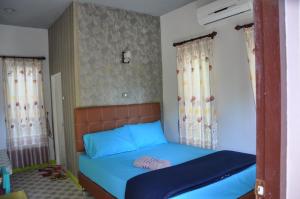 Postel nebo postele na pokoji v ubytování Feel Good Resort + 41 fotografií