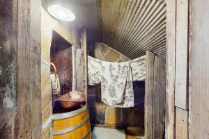 a room with a bunch of barrels and a towel at Walk to Trails & Fishing Spots! Lake Ozark Escape in Four Seasons +29 photos
