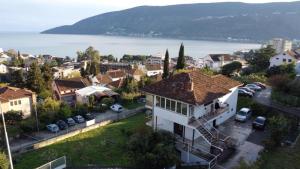 an aerial view of a town with a house at Maja Apartman in Igalo