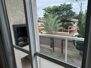 a view from the window of a balcony at Aparth ijui hotel in Ijuí