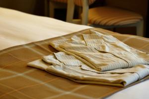 Postel nebo postele na pokoji v ubytování Hotel Monte Hermana Kobe Amalie