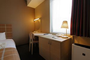 Postel nebo postele na pokoji v ubytování Hotel Monte Hermana Kobe Amalie