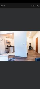 a view of a living room with a table and a kitchen at Apartment Andras in Murau +17 photos