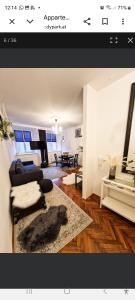 a living room with a couch and a table at Apartment Andras in Murau