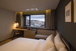 Φωτογραφία από το άλμπουμ του Bay Hound Hotel στο Μπουσάν