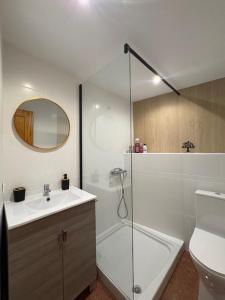 a bathroom with a shower and a sink and a toilet at Ikigai Home in La Rábita +57 photos