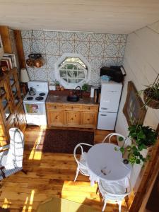 an overhead view of a kitchen with a table at Longview Spectacular Forest Views on 88 Acres in Westport