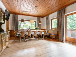 a dining room with a table and chairs at Zellner Top 9 in Alpbach