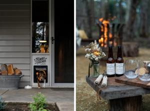 a dog standing outside of a door with bottles of wine at The Duckling in Glenlyon