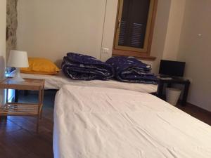 Ένα ή περισσότερα κρεβάτια σε δωμάτιο στο Residenza IMM.R