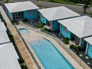 an overhead view of a house with a swimming pool at Villa Lua, Boqueron, Puerto Rico in Cabo Rojo