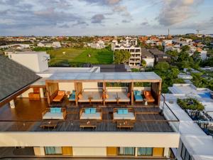 an aerial view of the roof of a building at BLive Coliving Canggu in Canggu