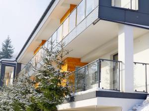 Balkón alebo terasa v ubytovaní Wellness Apartamenty Złoty Widok