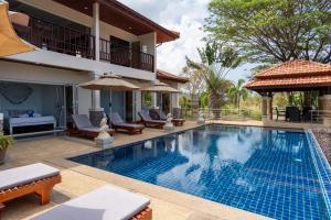 an image of a swimming pool at a villa at Amazing Seaview Villa Serena 4 Bedrooms in Ko Lanta